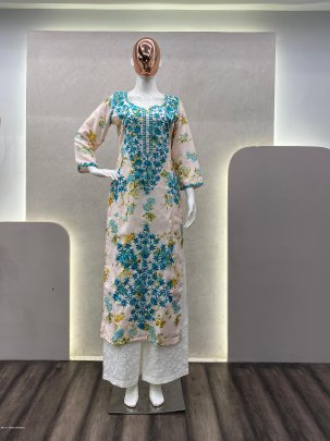 Attractive White And Blue printed rayon Kurti with cotton thread embroidered work palazzo