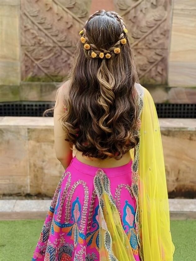 Crown braid flower attached open hairstyles for Wedding lehenga