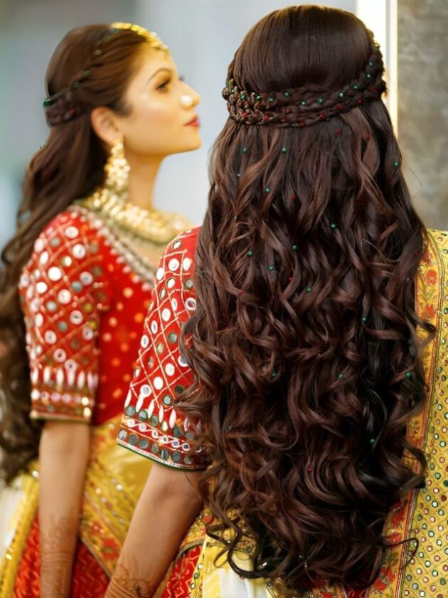 Half up half down braids hairstyle with saree for wedding