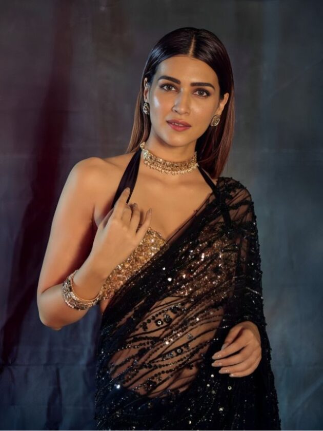 Kriti Sanon’s Middle Parted Sleek Straight Hair with saree for wedding