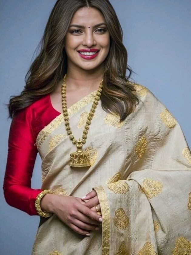 Priyanka Chopra in Simple Loose Curls at End Part hairstyle with saree for wedding