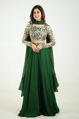 Beautiful Ivory Green Rangoli Silk Lehenga Choli