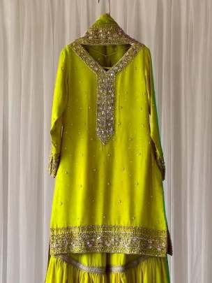 Elusive Parrot Green Sequence And Embroidered Georgette Sharara Suits