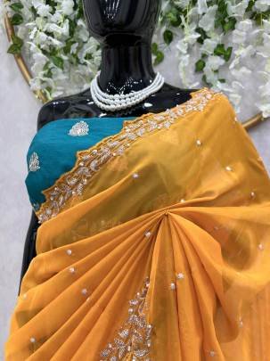 haldi special mustard yellow tebby silk saree with tread and moti work