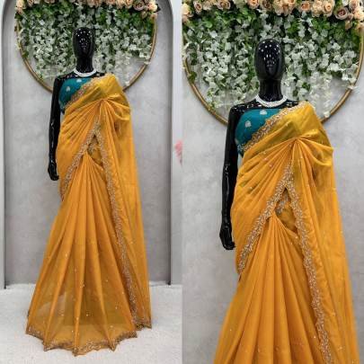 haldi special mustard yellow tebby silk saree with tread and moti work