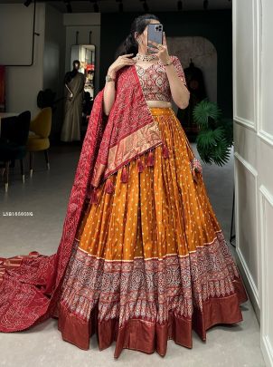 Orange Dola Silk Bandhani And Ajrakh Print With Foil Work Lehenga