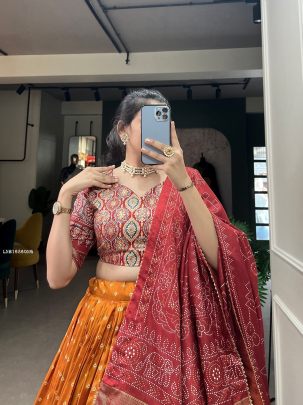 Orange Dola Silk Bandhani And Ajrakh Print With Foil Work Lehenga