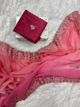 Peachy Pink Saree And Blouse With Beautiful Cutting Border.