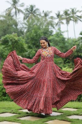 Presenting maroon  Designer Gown with Traditional Kodi Work 