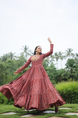 Presenting maroon  Designer Gown with Traditional Kodi Work