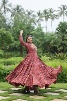 Presenting maroon  Designer Gown with Traditional Kodi Work