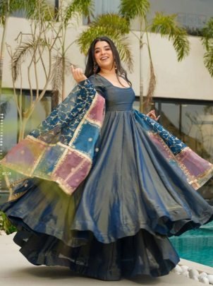 Stunning Carosin Colour Paired With A Beautiful Embroidered Multi tone Dupatta