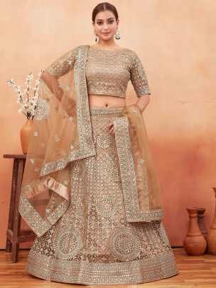 Wedding Wear Cream Color Stone and Embroidered Work Net Lehenga choli