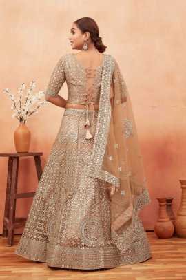 Wedding Wear Cream Color Stone and Embroidered Work Net Lehenga choli