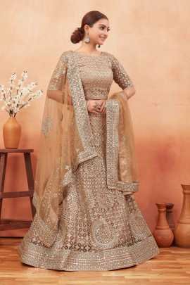 Wedding Wear Cream Color Stone and Embroidered Work Net Lehenga choli