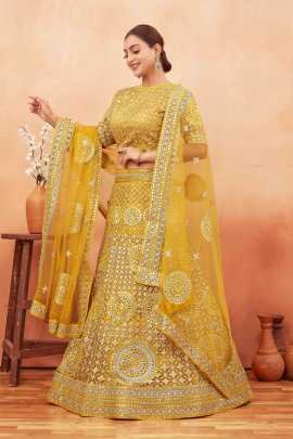 Wedding Wear Yellow Color Stone and Embroidered Work Net Lehenga choli