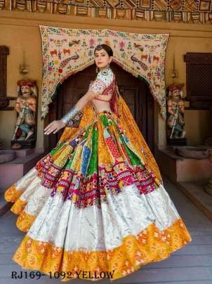 Yellow Color Fancy Heavy Butter Silk And Real Mirror Work Navratri Lehenga Choli